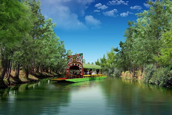 2-Day Guadalupe Shrine, Teotihuacan Pyramids and Xochimilco - Xochimilco Canals by Aztec Boat: UNESCO Waterways With Real Crowds