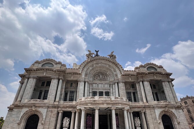 Mexico city's private tour in downtown (with transport) - Zócalo square: flag ceremony details, subway models, and a foundation monument