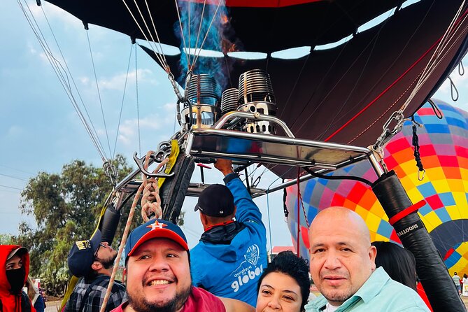 Teotihuacán in a hot air balloon with Transportation from CDMX - Coffee, cookies, and balloon inflation watching before lift-off
