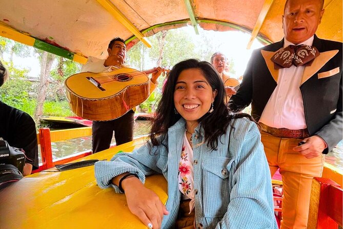 Trajinera ride in Xochimilco - Xochimilco stop: music, crafts, greenhouses, and optional animal stops