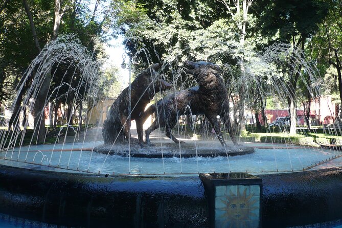 Xochimilco, Coyoacan and Frida Kahlo Museum Tour - UNAM campus visit: murals, Olympic Stadium, and UNESCO vibes