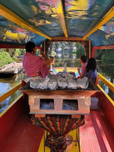 Xochimilco: Market, Food and Nature ¡All included! Tour - Riding a trajinera through the protected canal world