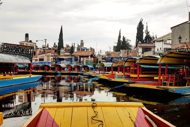 Xochimilco Tour: Visit Coyoacan and Casa Kahlo in Mexico City - UNAM’s central library murals: a short stop with big visual impact